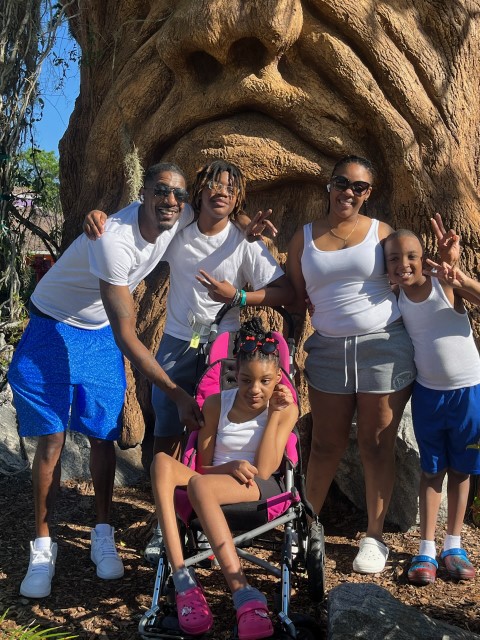 Paris and family at the Tree of Life